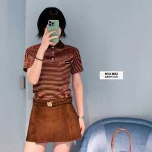 Miu Miu - Polo rayé ajusté - Orange et noir