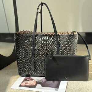 Alaia - Cabas cuir perfore noir avec pochette